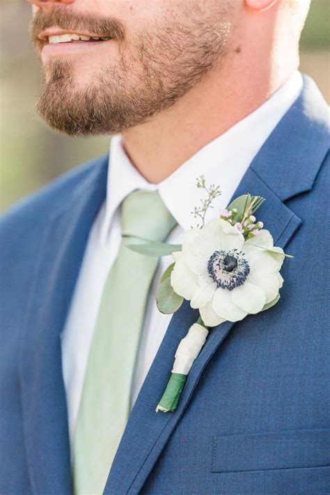 blue suit with sage tie.